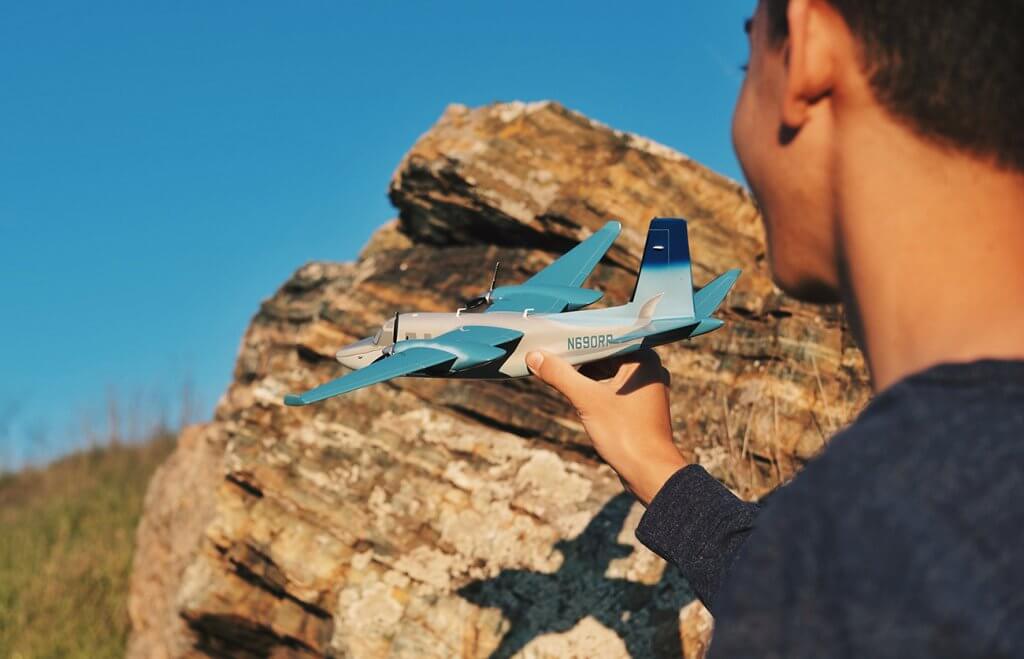 8 year old boy playing with a toy