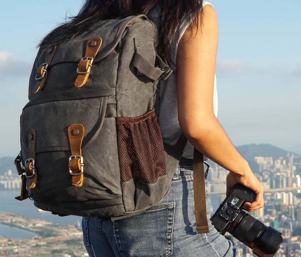 Abonnyc Vintage DSLR Backpack worn in the outdoors