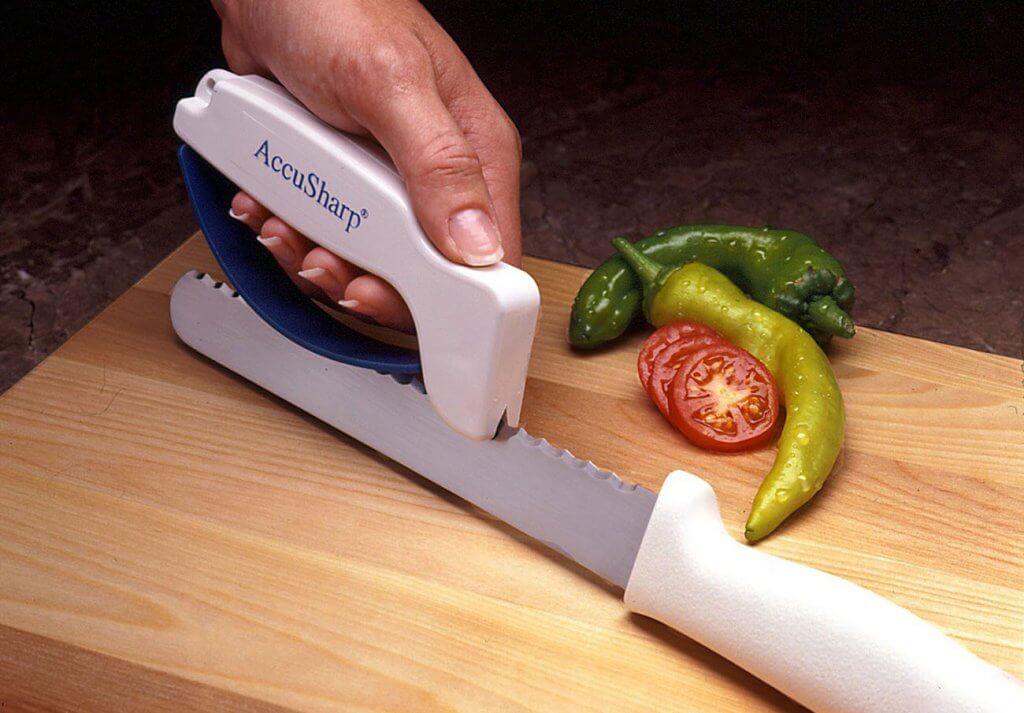 AccuSharp 001C Knife Sharpener on cutting board