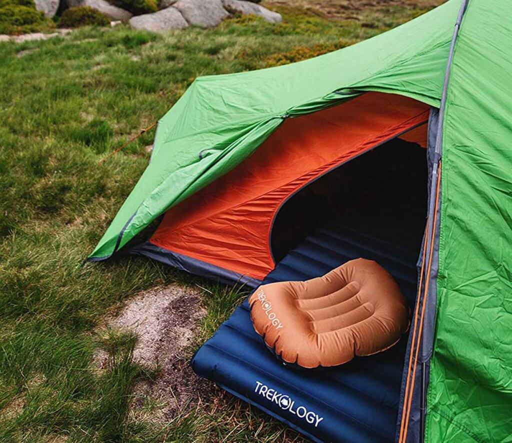 Aluft Ultralight Inflating Travel and Camping Pillow in a tent