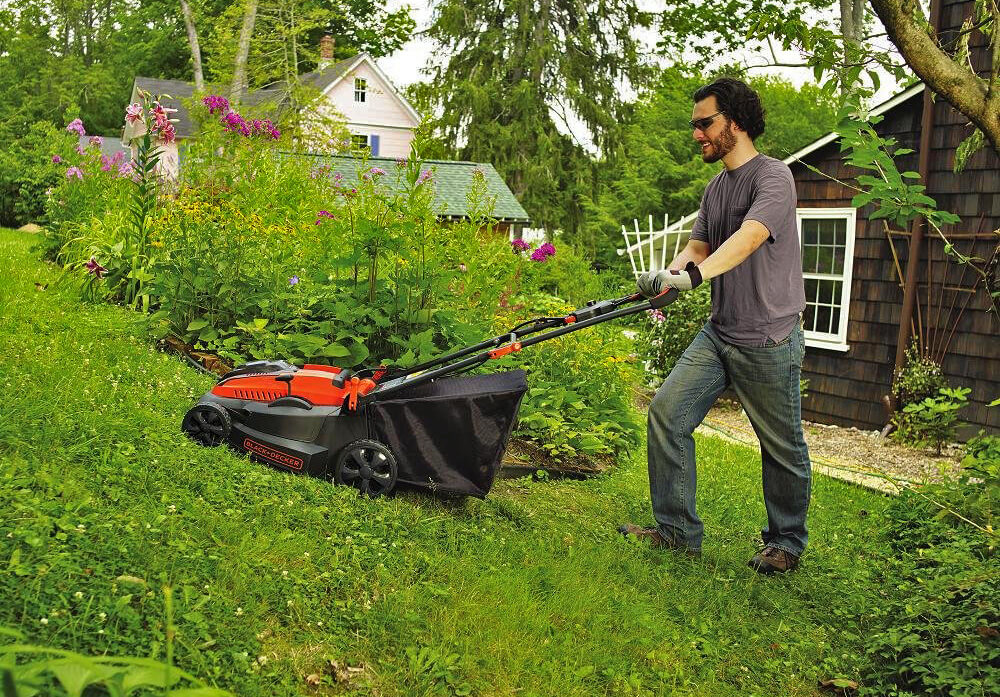 Black+Decker 16-Inch 40-Volt Cordless Lawn Mower on hill
