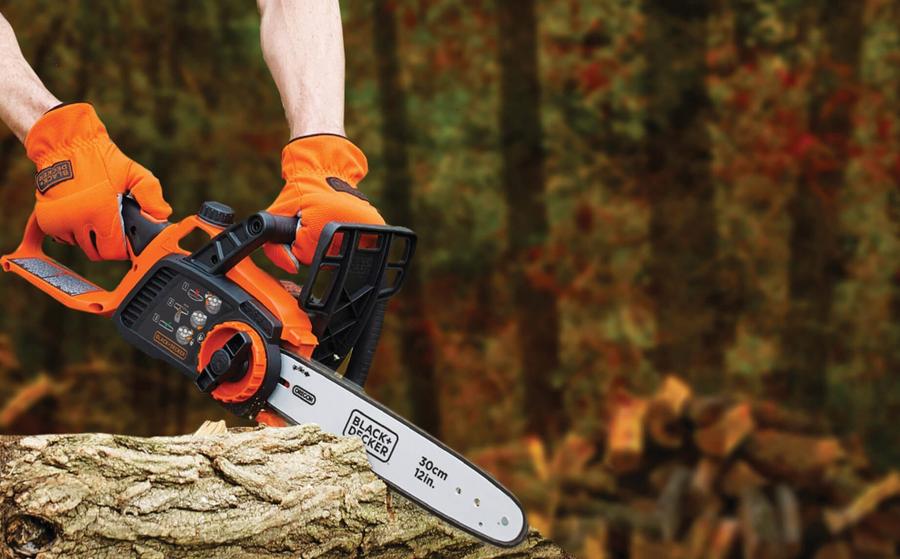Cordless Electric Chainsaw cutting a tree