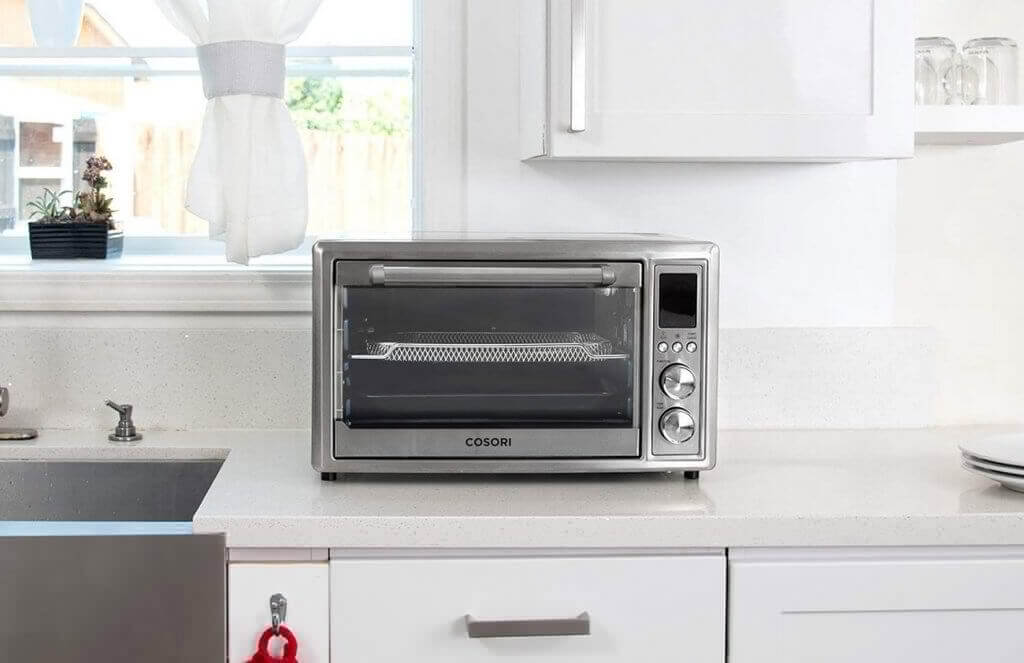COSORI CO130-AO Air Fryer Toaster Oven on the countertop