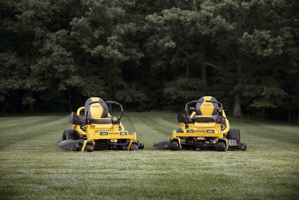 Two Cub Cadet Ultima ZT1 in a big garden