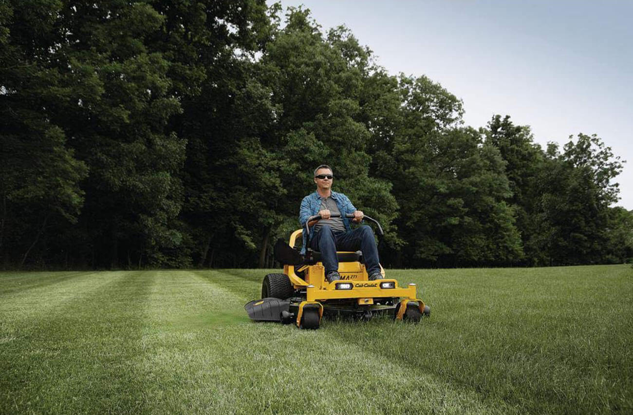 Zero Turn Lawnmower cutting grass