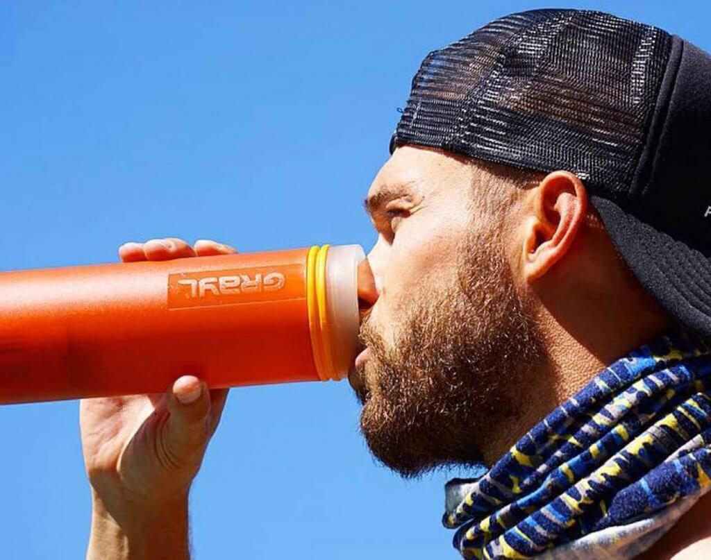Drinking out of the GRAYL Ultralight Water Purifier Bottle