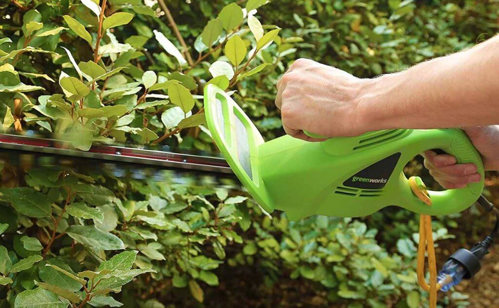 Greenworks 18-Inch Hedge Trimmer in action