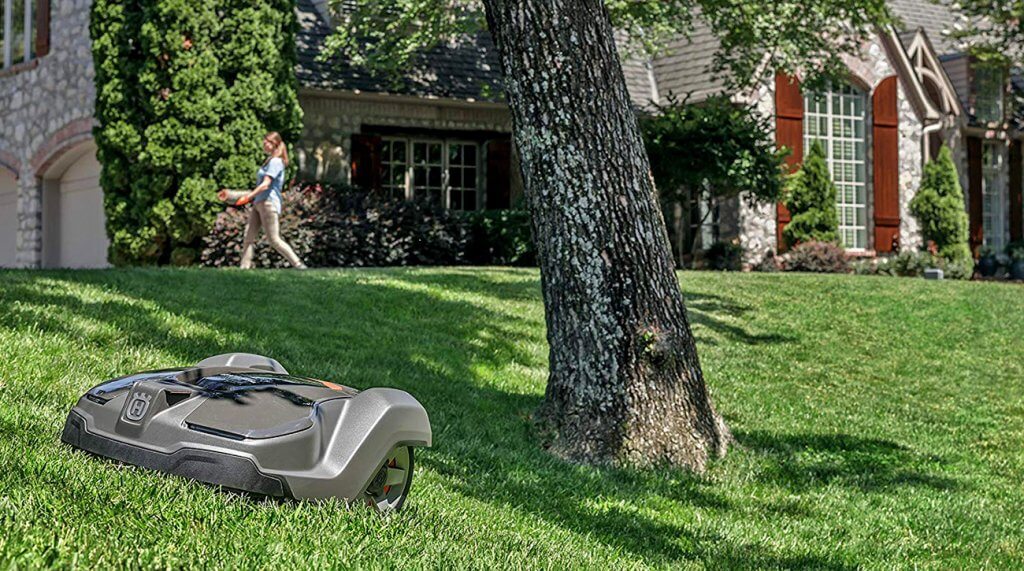 Husqvarna 430X on a grassy hill