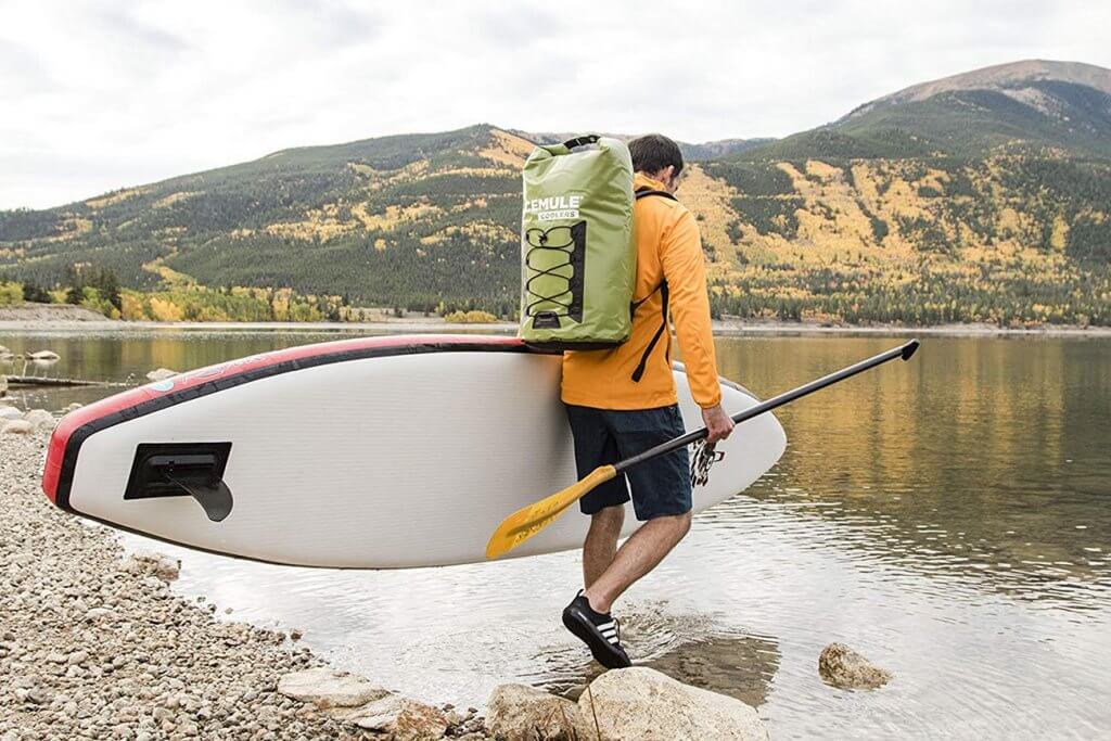 IceMule Pro XXL Insulated Backpack Cooler Bag on a lake