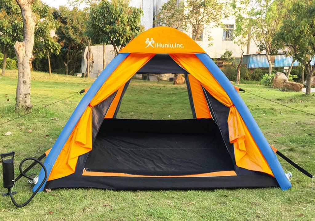 IHUNIU, INC. 4 Person Inflatable Camping Air Tent in the garden