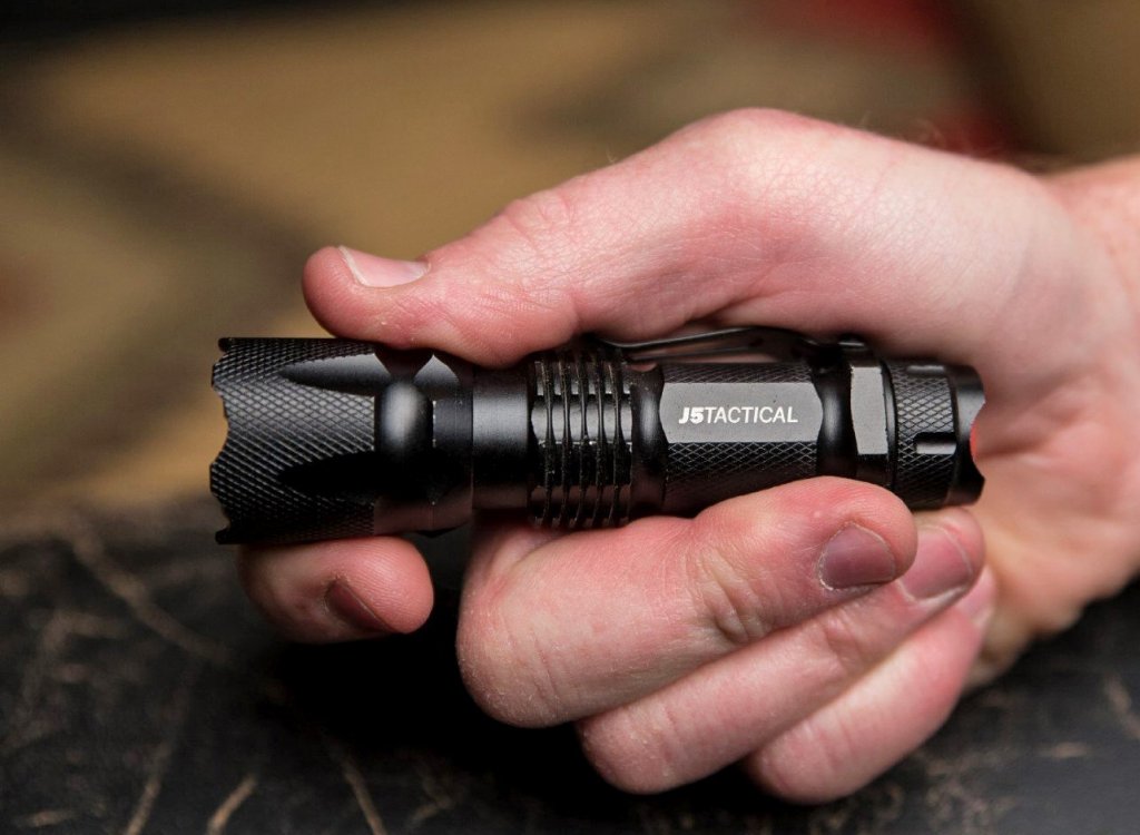 J5 Tactical V1-PRO Flashlight in hand