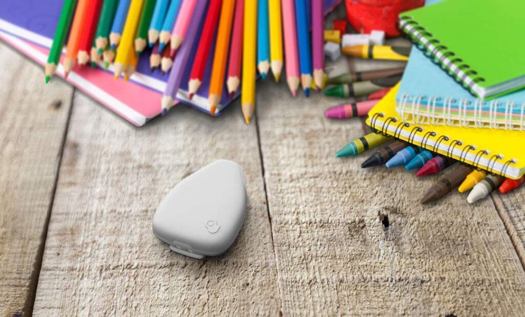 Jiobit GPS Tracker next to pencils