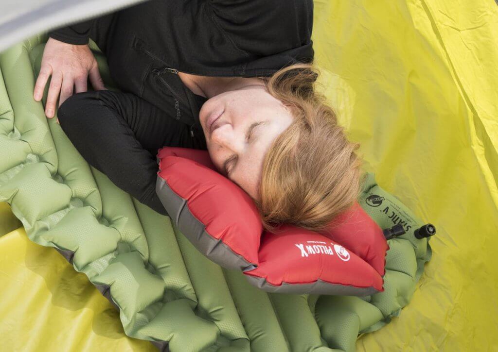 Klymit Pillow X Inflatable Camping And Travel Pillow on mattress