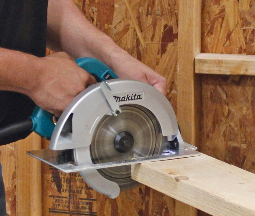 Makita 5007F Circular Saw cutting into wood
