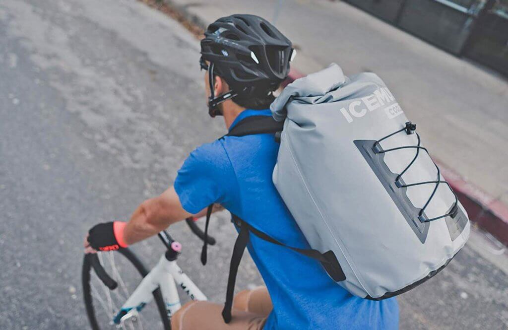 Orvis IceMule Pro Cooler carried by a biker