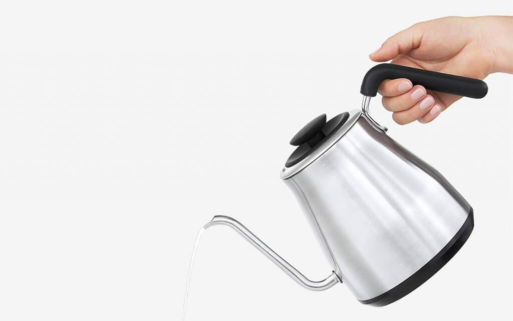 Pouring hot water out of the OXO BREW Pour-Over Kettle