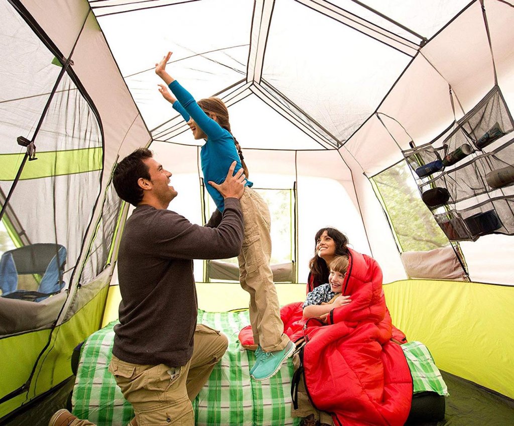Family in the Ozark Trail 9-Person Instant Cabin