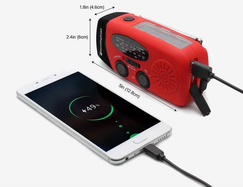 Running Snail survival radio used for charging smartphone