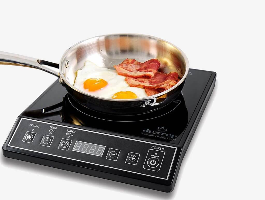 cooking bacon and eggs in the Secura 9100MC