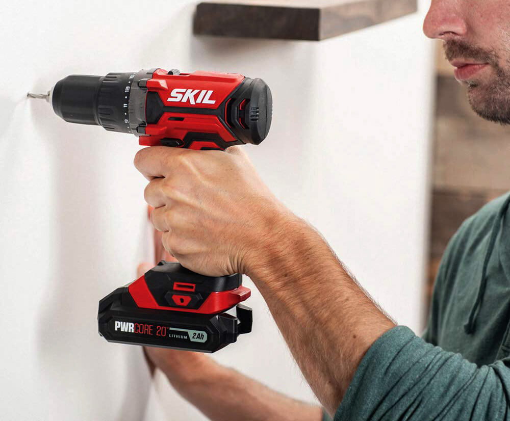 SKIL 20V PWRCore used for drilling a hole in a wall