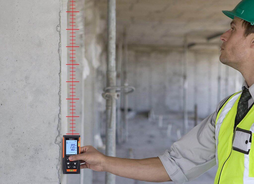 Tacklife HD60 Classic Laser Measure used on construction site