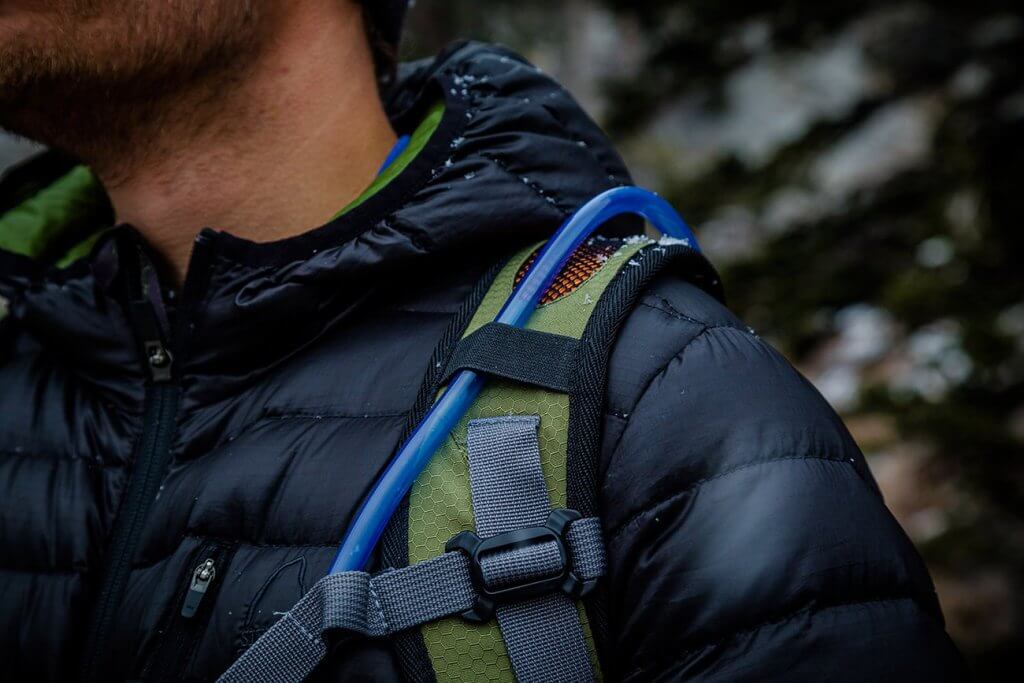 Hiker wearing the TETON Sports Oasis 1100 Hydration Pack
