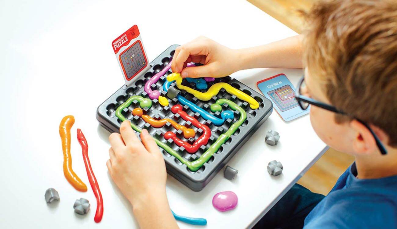 10 year old boy playing with a toy