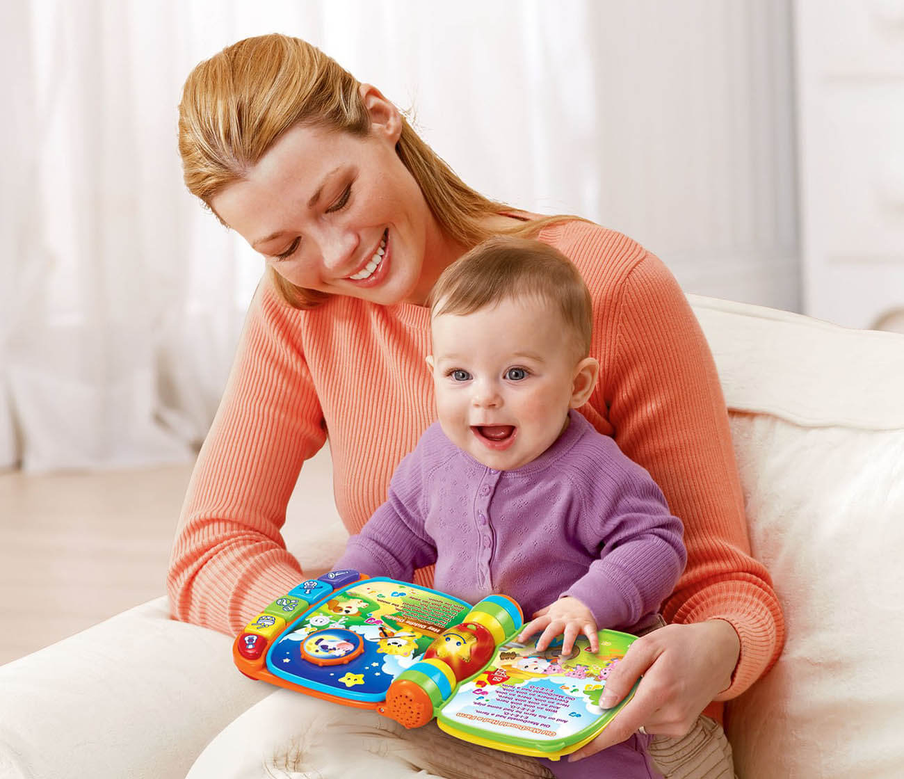 One year old boy playing with toy