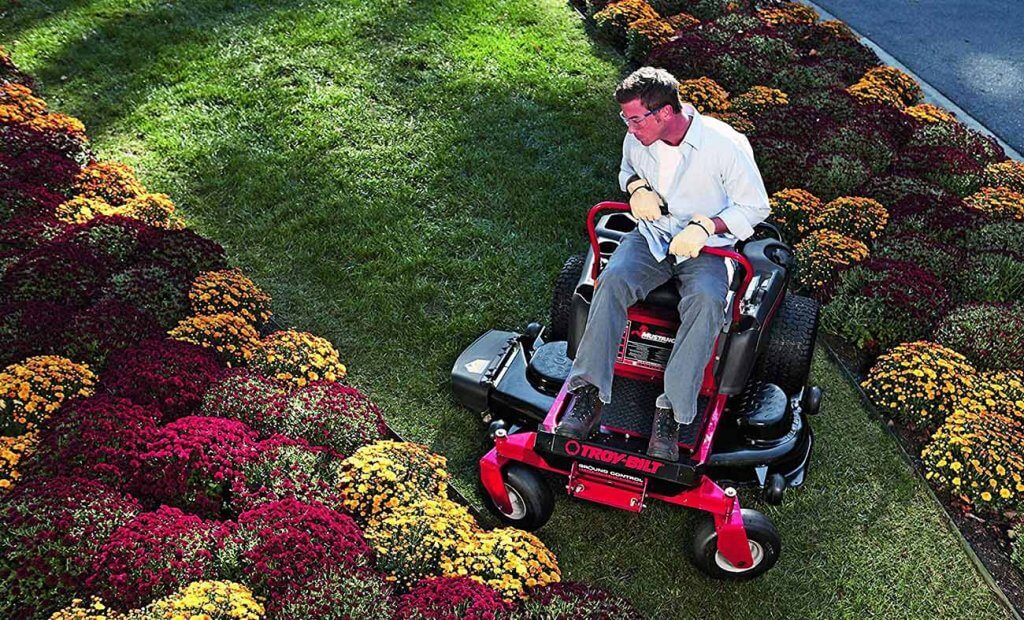 Troy-Bilt Mustang Zero-Turn Riding Lawnmower in the yard