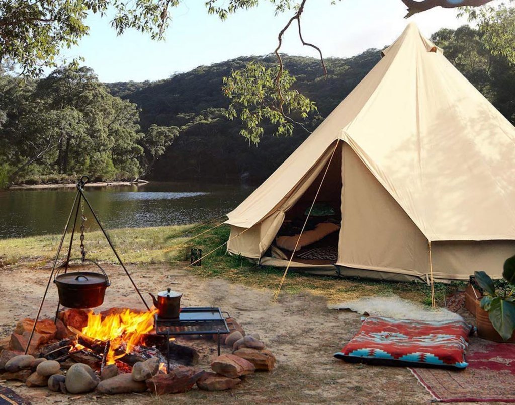UNISTRENGH 4 Season Waterproof Cotton Canvas Bell Tent on a camping trip