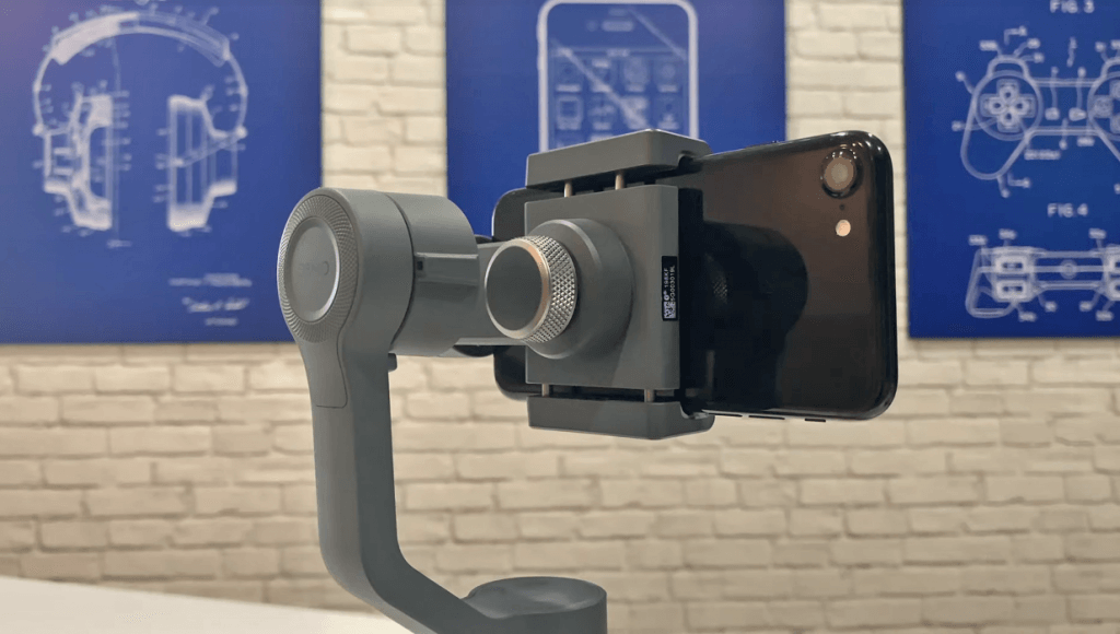 DJI OSMO Mobile 2 and black iPhone
