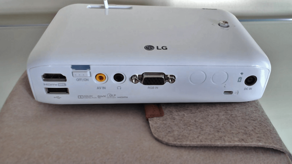 LG PH550 CineBeam LED Mini Projector on bag