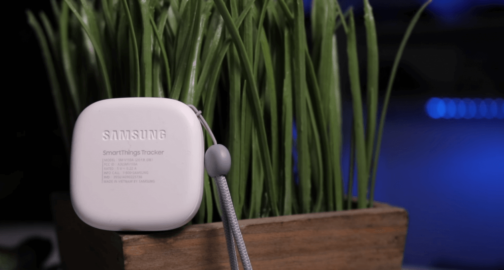 Samsung SmartThings Tracker next to plant